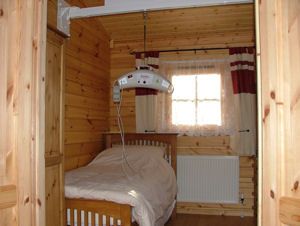 Hampton Court Holiday Park - bedroom with ceiling track hoist